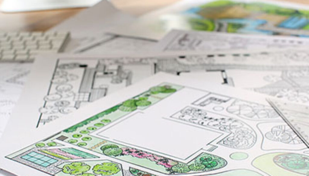 Landscape designer's projects on table in office