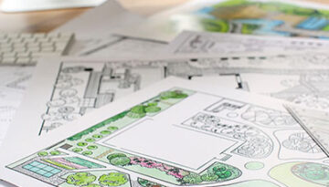 Landscape designer's projects on table in office