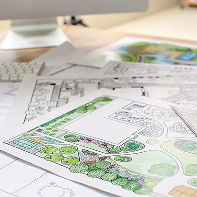 Landscape designer's projects on table in office